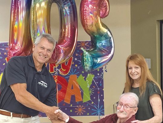 102-year-old Herbert Parsons and his daughter Georgia were congratulated by Mayor pro tem Craig Magerkurth, who awarded the Granite Mesa resident the key to the city of Marble Falls Sept. 26. Contributed Photo