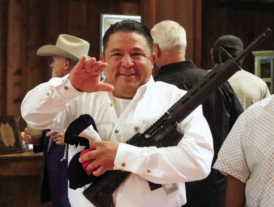 Advocacy Center event raises guns and funds