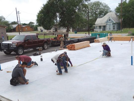 Surrounded by just-arrived construction materials, the crew with Cecil Jackson Construction was in full swing Wednesday morning preparing the foundation for the floor trusses and walls of the African American Museum being built at 311 Ave. N. in Marble Falls. Photos by Beverly Walker/The H...