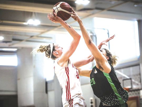 Known for her defense and protecting the rim, Mya Berkman blocks a shot to give her GAS Evnikos Women's basketball team another possession. Contributed photos