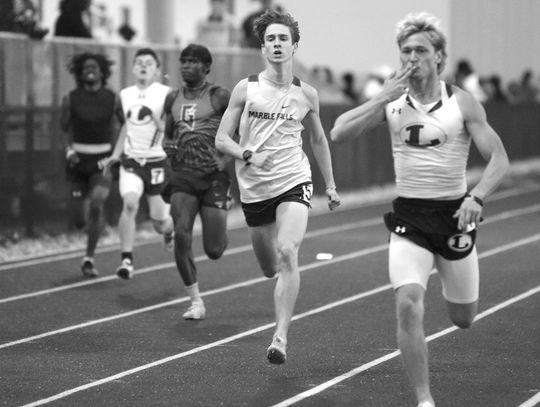Photos by Martelle Luedecke/ Luedecke Photography Marble Falls freshman Graham Goggans is on his way to finishing second in the 400 meters behind Lampasas junior Sean Smith.
