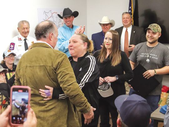 Martelle Luedecke/ Luedecke Photography Emotions overflowed when Scott Hendrix walked into the ceremony Dec. 10 at Spicewood Fire Rescue.