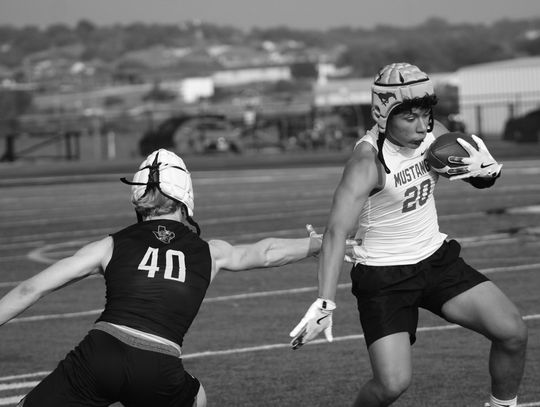 Joaquin Aguilar tries to avoid being tagged during a contest against Llano. Photos by Jennifer Fierro/TexasChalkTalk.com