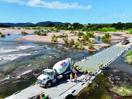 Crews lay foundation for flood-damaged Kingsland Slab