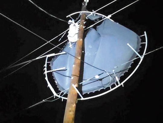 After high winds blew through Burnet County May 29, Pedernales Electric Cooperative was called to remove a trampoline blown onto a power pole located in the 1400 block of Redwood in Granite Shoals. Contributed photo