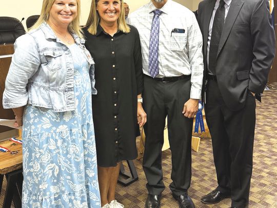 Pictured, from left, are MFMS Associate Principal Haley Wheeler, Shelley Cochran, MFMS Principal Rudy Gonza - lez, Superintendent Jeff Gasaway.