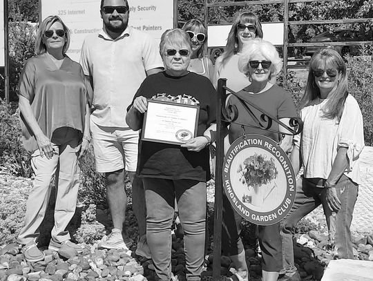 Pictured from left to right are Cheri Finkelstein, Andy Virdell, Darlene Zubkus, Cynthia Green, Barbara Rosenberger, Mary Ann Atwood and Mina Martin receiving the Kingsland Chamber's 2024 Beautification Award for the Kingsland Community Park's Native Plant Garden. Contributed photo