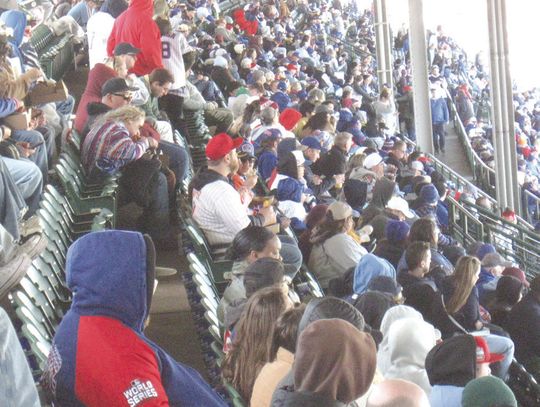 Hundreds of Chicago Cubs fans braved chilly weather April 26 at Wrigley Field as they watched their team battle the Philadelphia Phillies.