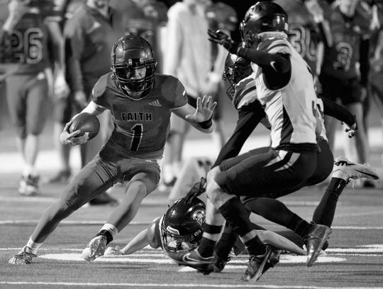 Faith Academy junior Andrew Houy stops on a dime to try to reverse his field. Contributed photos/Stennis Shotts