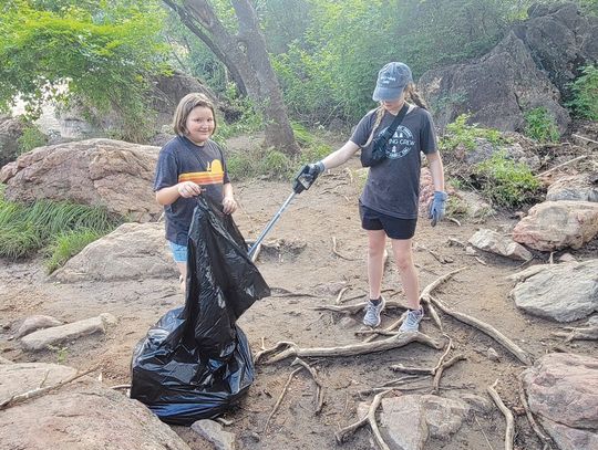 Girl Scouts help clean up Inks Lake State Park