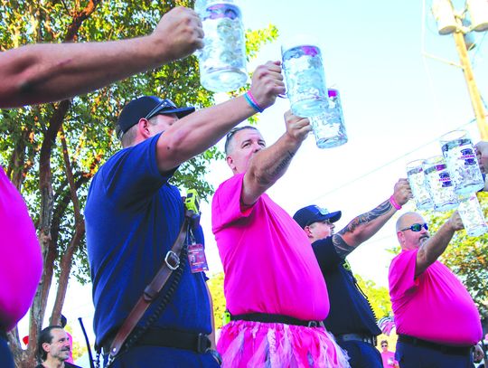 First responders competed in the Stein Hold at Pinktoberfest in Harmony Park Oct. 24. Find more photos on Page 14. Martelle Luedecke/Luedecke Photography