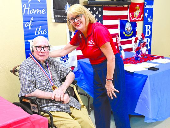 Contributed photo Bobby Sears received a 'Hidden He - roes' medal Sept. 12 in recognition of his service as a U.S. Navy veteran. Ruth Reed of Our House Real Estate coordinated the ceremony.