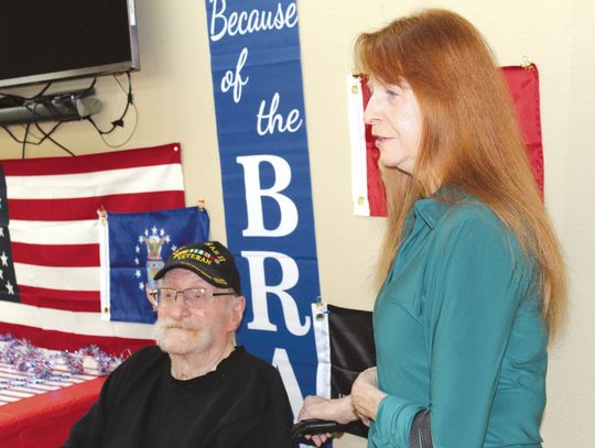 U.S. Army veteran Herbert Parsons and his daughter Georgia Parsons of Spice - wood enjoy the 'Hidden Heroes' Veterans Day celebration in Marble Falls at the Granite Mesa Center. Raymond V. Whelan/The Highlander