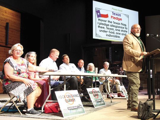 From left, Martha Tyroch, Stacy Smith, Burnet County Commissioner Pct. 1 Jim Luther Jr., Randy Printz, Burnet Mayor Gary Wideman, Nan Manning and Jay Folta listen as Texans for Responsible Aggregate Mining spokesperson Fermin Ortiz addresses the Town Hall meeting audience Sept. 14. Raymond...