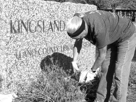 The Kingsland Garden Club will host its annual Plant Sale on Saturday, March 22, 8 a.m. to noon. Pictured is Kingsland Garden Club member Luellen Schoen maintaining native plants on the grounds of Kingsland Library. Beverly Walker/The Highlander