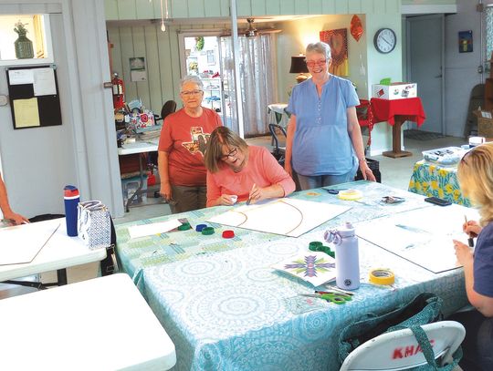 Janet Plentl of JaVibe Barn Quilts works with students Pamela Williams of Smithwick, Ladonna Crow of Burnet County, Jenny McCoy of Lampasas and Joy Frear of Marble Falls; they are representative the wide collection of local talents supporting the Kingsland House of Arts and Crafts. Beverly...