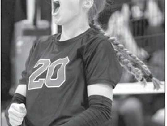 Freshman Ella Claiborne celebrates earning a key point for the Lady Flames. Contributed photos/Stennis Shotts