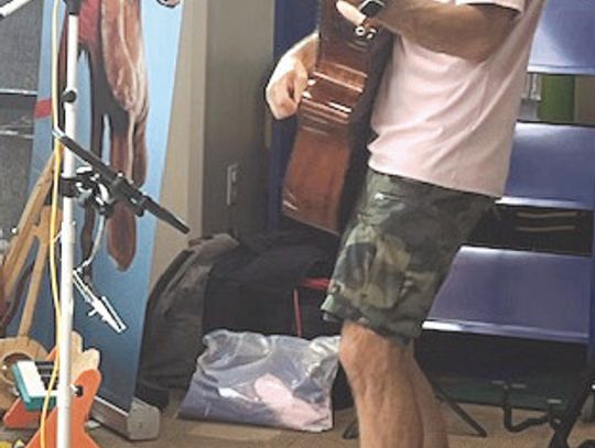 Symon Hajjar of Hot Toast Music entertained youngsters with whimsical music.