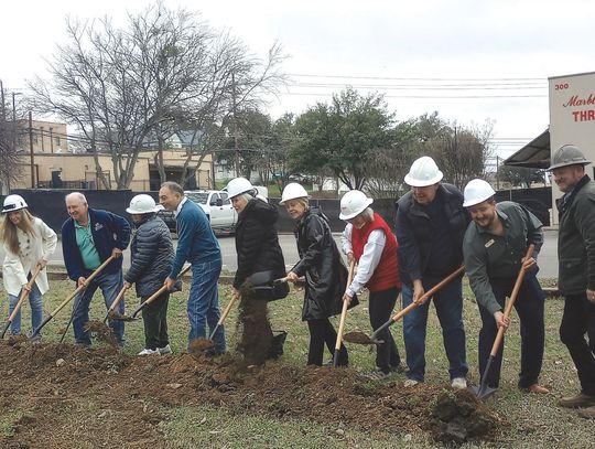 A group of Friends of the Marble Falls Library and other supporters gathered Feb. 12 to break ground for an extensive expansion project for the library's thrift store at 300 Ave. J. It is expected to take about a year to complete the $1.6 million addition. Beverly Walker/The Highlander