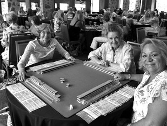 Ellen Hower, Nancy Heerssen, and Mary Ellen Zupansky settled in for a turn at the tiles at the Horseshoe Bay Resort Mah Jongg Play Day May 29. The group is prep - ping for the upcoming fundraising tournament. Contributed photo