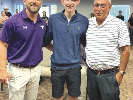 From left, Coach Austin Silva, runner Tyler Hamblin, and Coach Chris Schrader savor the moment  Hamblin was the only track and field state finalist this year. Contributed photos
