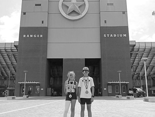 Josie and Everett Brasher wear medals that signify they are advancing to the Junior Olympics. Contributed photos