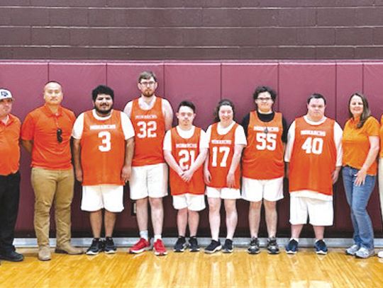The Marble Falls Monarchs Special Olympics basketball team recently won a bronze medal during a tournament in San Marcos. From left, Coach Luke Bailey, Team Booster Phong Nguyen, players Santos Morales, Devin Copus, Jaden Lizcano, Taylor Johnson, Daniel Pugh, Peldar Stogsdill, Coach Fallan...