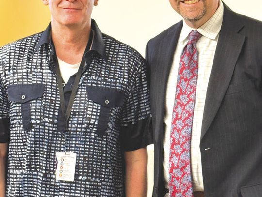 In recognition of his exceptional contributions to student learning, first-year Spanish teacher Kendall Moss, at left, was presented with the September Spotlight on Excellence Award by Superintendent Jeff Gasaway. Contributed photo/MFISD