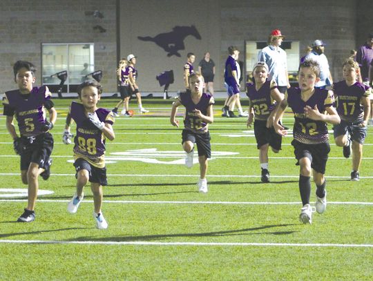Players of the Marble Falls Youth Football and Cheer will run through the giant Mustang tunnel Saturday, Sept. 7, to begin the 2024 season. Photos by Jennifer Fierro/TexasChalkTalk.com