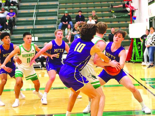Marble Falls seniors Tidus Willie (left), Noah Lyon, and Garen Jones (10) and Reed Lewis commit to playing tenacious defense to make it difficult on the Bulldogs to make shots. Contributed photos by Martelle Luedecke/Luedecke Photography