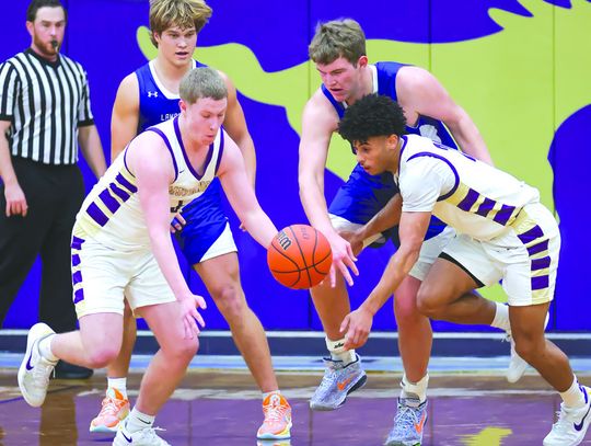 Contributed photos by Christopher A. Miles/ Christopher A. Miles Photography Marble Falls seniors Noah Wylie (left) and Tidus Willie go after the loose ball to get another crucial possession against the Lampasas Badgers.