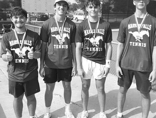 and Cooper Kelley wear their gold medals and Nicolas Smith and Payton Glaser wear their silver medals signifying their finishes at the District 24-4A tournament. The boys doubles teams of Weston York (left)