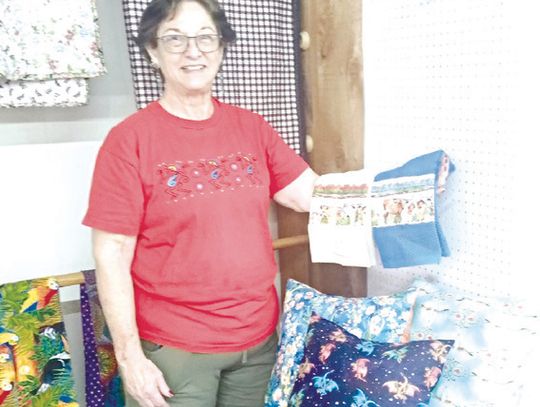 Contributed Photo Joanne Hanifan displays her work at the Kingsland House of Arts &amp; Crafts.