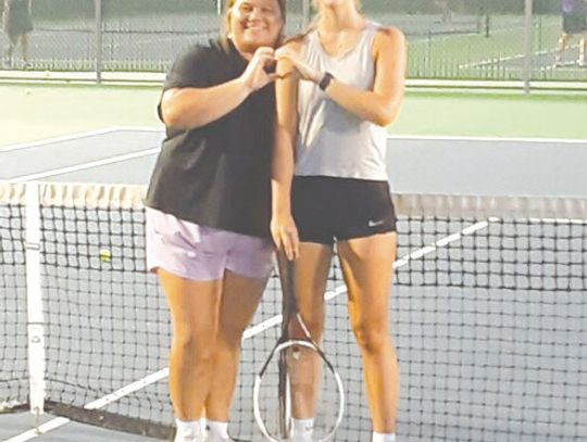 Marble Falls High School tennis players Sophia Trudeau (left) and Chloe Brown are at the Charlie and Nancy Herrington Tennis Center for an evening of competition during open courts night. Contributed photo