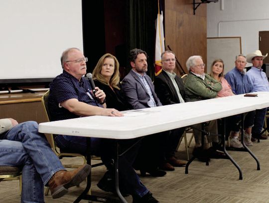 From left, Burnet County Commissioner Pct. 1 Jim Luther Jr., County Elections Administrator Doug Ferguson, Hart Civic representatives Felice Liston, Sam Derheimer, Rich Geppert, Gillespie County Elections Administrator Jim Riley, Gillespie County Clerk Lindsey Brown, Pct. 4 Commissioner Jo...