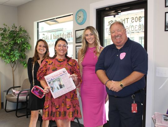 Pictured, Oct. 24, are: volunteer Carissa Harmon, Marble Falls council members Lauren Haltom and Karlee Hubble and Assistant Fire Chief Coy Guenter. Connie Swinney/The Highlander