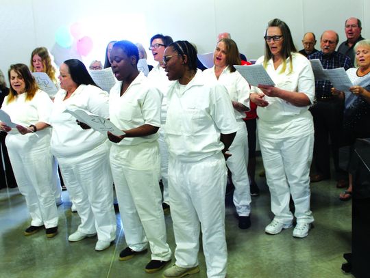 Several members of the Halbert Unit praise team sung 'Great is Thy Faithfulness,' during the dedication of the new Joseph's Hammer Chapel in Burnet June 13. Raymond V. Whelan/The Highlander