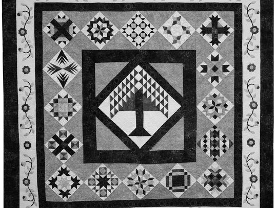 Attendees of the 2025 Quilt Festival might win 'Tranquility,' a queen-sized quilt sewn by the HLQ Guild members and quilted by Leslie Sparks. Tick - ets are available at the show or from members. Contributed photo