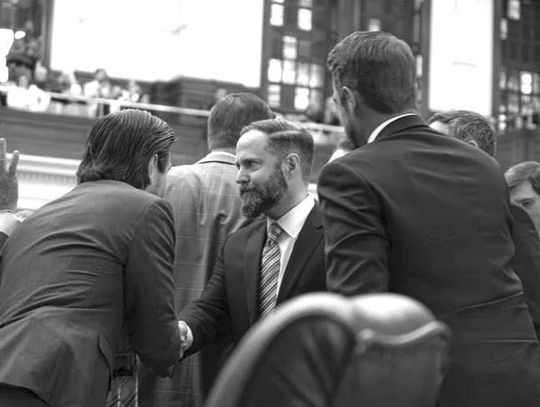 Speaker Dustin Burrows is pictured here receiving congratulatory handshakes from colleagues. Contributed/Mazlin Jordan/The Texan