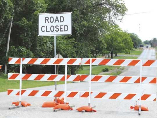Connie Swinney/The Highlander Avenue N from the railroad tracks at the Huber Mining plant to the Avenue S intersection is closed pending the start of work on a structure over the flood-prone low water crossing. Motorists will detour through Avenue S instead of Johnson Park, which is closed...