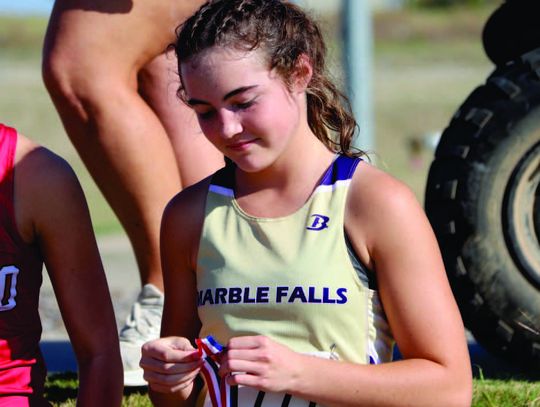 Runners learn plenty while competing in regions toughest district