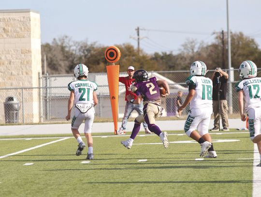 Marble Falls quarterback Charles Wood weaves his way to the end zone for the Mustangs' final score of 2024.