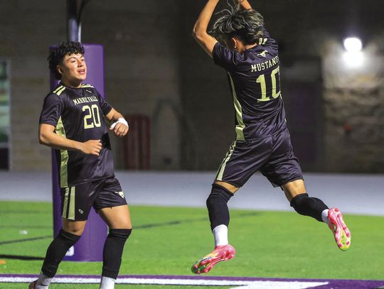 Joaquin Aguilar (lett) jumps with Marco Almazan as the Mustangs begin to celebrate a late goal against Davenport.