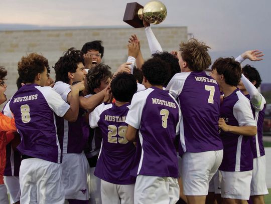 Soccer team handles 'unfinished business', wins district title