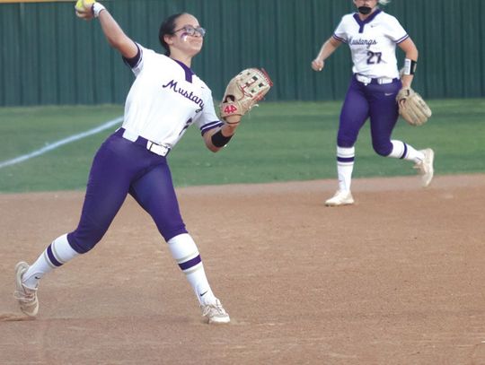 Third baseman Cheyenne Thompson (left) and shortstop Kylie Roberts made every play when the ball bounced their way to frustrate Lampasas and help their team win.