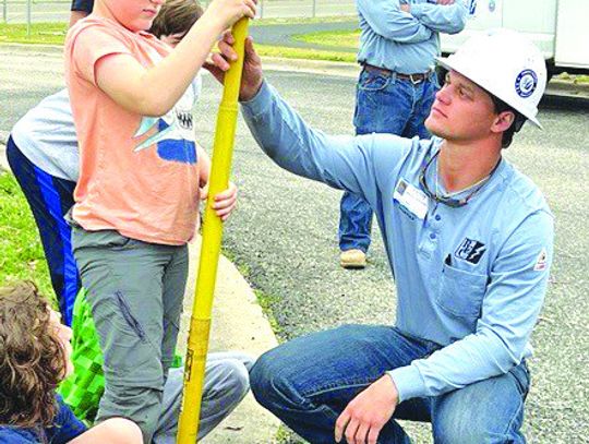 File photo Spice wood Elementary School students partici - pate in a number of hands-on activities, including a recent presenta tion and tour with Pedernales Electric Coopera tive.