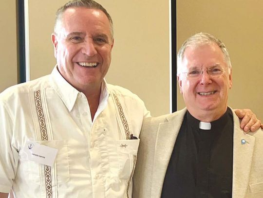 Well known host of the radio talk show 'The Busted Halo,' left, Father Dave Dwyer, C.S.P., traveled to Horseshoe Bay Sunday to help, right, St. Paul's Pastor Father Brad Schoeberle, C.S.P. celebrate both of their 25th anniversaries in the priesthood. Dwyer is a seminary classmate of Schoeb...