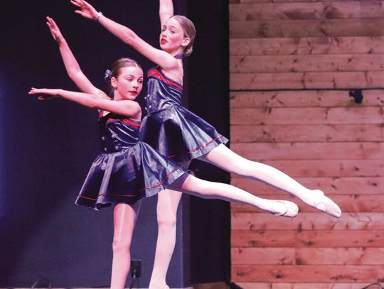 Harmony School of Creative Arts Academy of Dance spring performance, Dance 365, dress rehearsal was held May 15 at Hill Country Fellowship. Pic tured are Natalie Howlett and Hannah Burks, during a patriotic feature in the show. Find more photos on Pages 7 and 8. Martelle Luedecke/Luedecke...