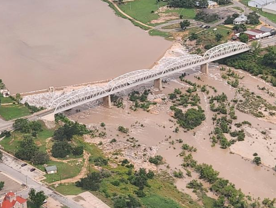 An aerial view by Steve Zbranek showed how much water rushed over the spillway of Town Lake in the heart of Llano, following late last week and into part of the weekend. Runoff will make its way from the Llano River through the Slab Road water crossing, CR 304/ CR307) in Kingsland to lakes...