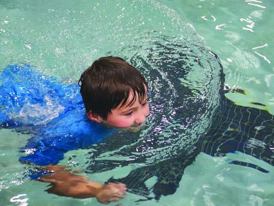 Anson McDonald went for a swim during the End of Summer Pool Party July 25 at the YMCA of the Highland Lakes in Burnet. Find more photos on Page 9 Martelle Luedeceke/ Luedecke Photography